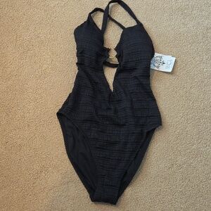BECCA Very black swimsuit textured w/gold ring at chest plunge front hi legs NWT